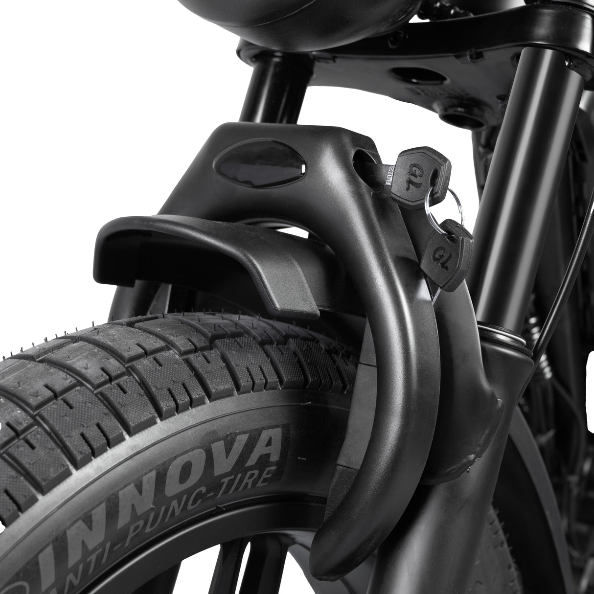 Close-up of a bicycle tire with Innova branding on a white background