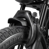 Close-up of a bicycle tire with Innova branding on a white background