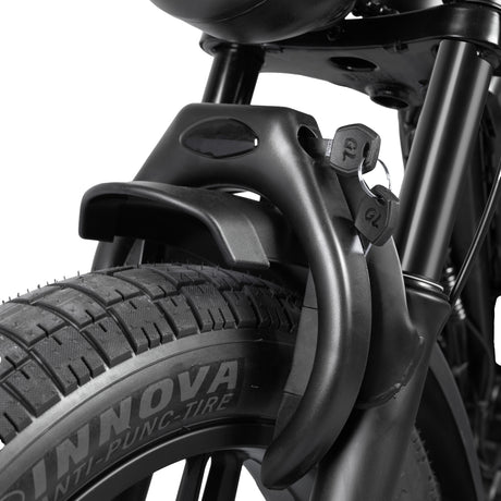 Close-up of a bicycle tire with Innova branding on a white background