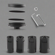 Set of black cylindrical components and a screw on a white background for GPS AirTag