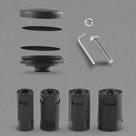 Set of black cylindrical components and a screw on a white background for GPS AirTag