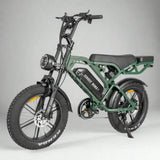 Green electric bike with black seat on a gray background