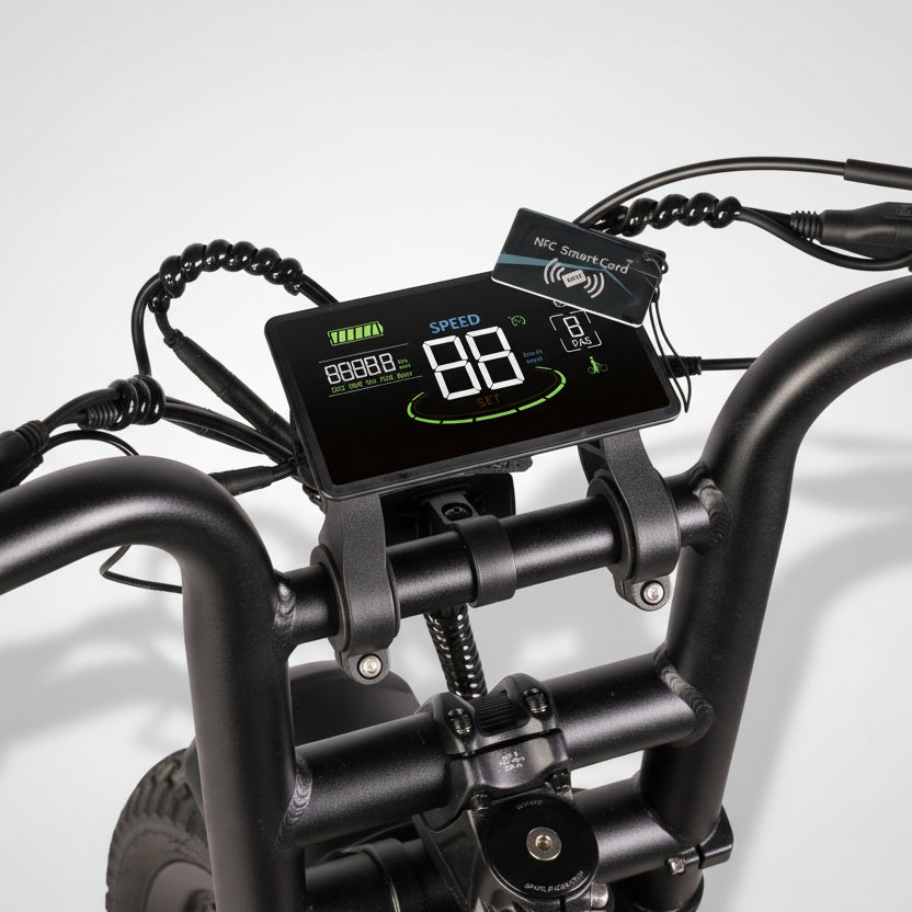 Digital speedometer on a bicycle handlebar with visible brand name.