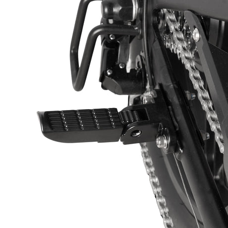 Close-up of a motorcycle chain and sprocket system on a white background