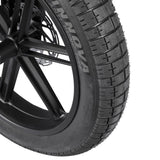 Close-up of a car tire with 'INNOVA' branding on a white background